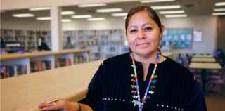 Portrait of woman in library