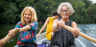 Two women rowing a boat